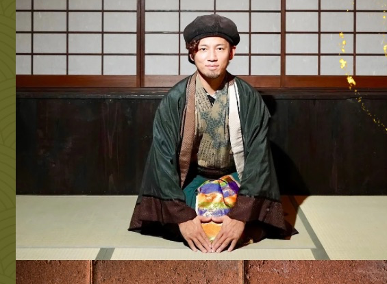 Masaki seated on tatami